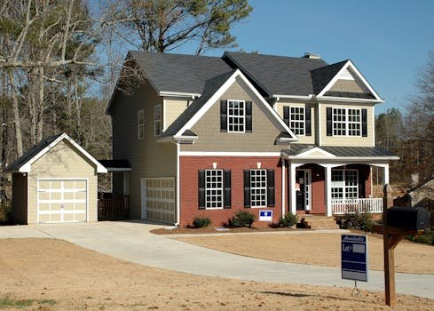 pexels-photo-164522-164522 Beautiful two-story home with garage in a serene neighborhood, perfect for families.